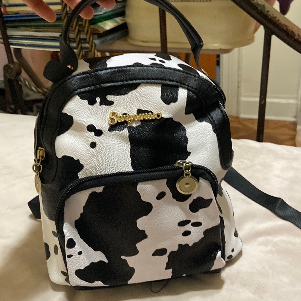 Beautiful cow print mini backpack!